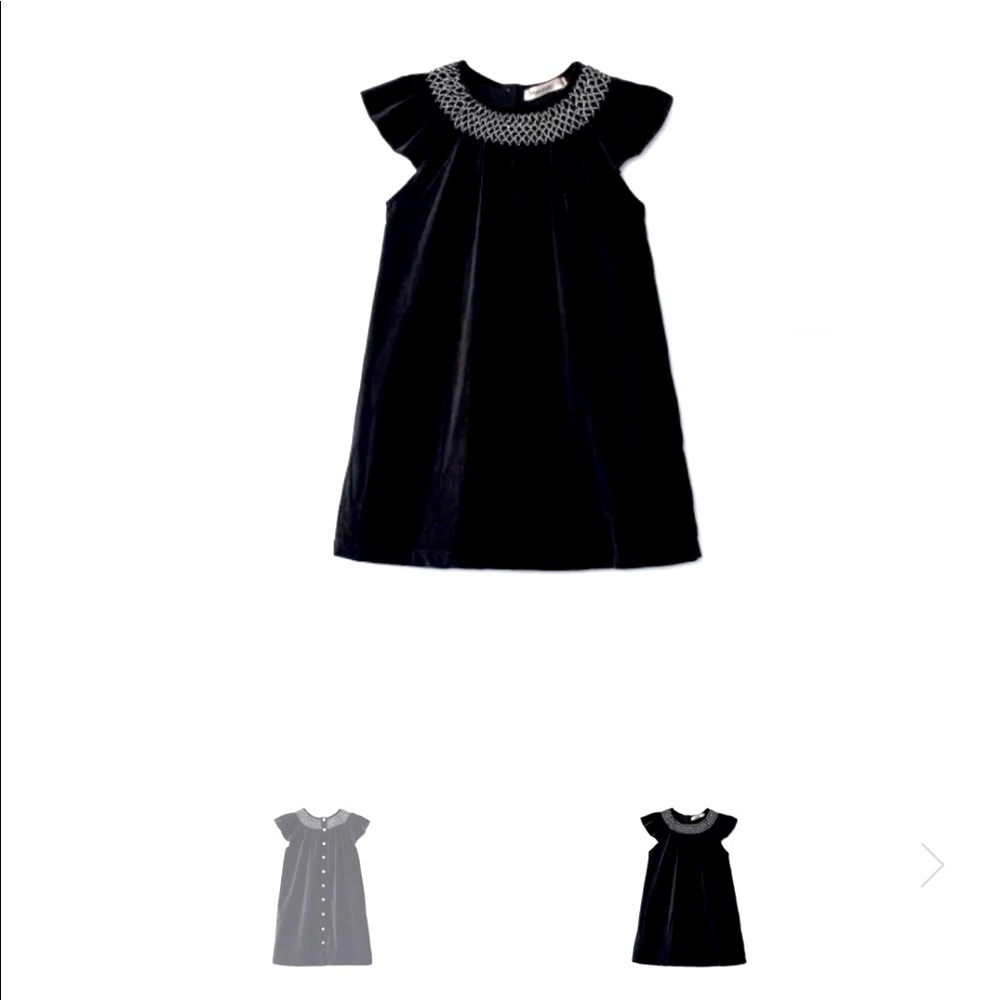Girl black velvet smocked jumper size 6